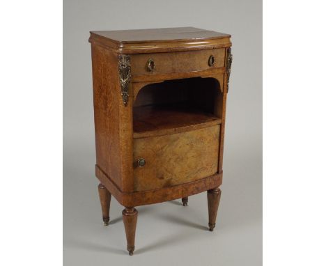 An early 20th century bird's eye maple veneered Louis XVI style bedroom suite comprising of kneehole dressing table, with ova