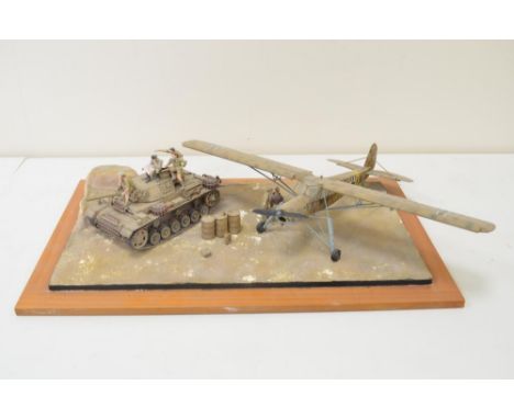 Highly detailed and very well constructed 1/35 scale plastic model WWII diorama depicting German Army Panzer IV and Fieseler 