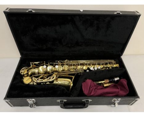 A saxophone with a mouth piece and curved neck, in a fitted case