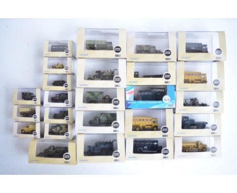 Twenty five boxed 1/76 scale (OO gauge) diecast Military vehicle models from Oxford Diecast, model condition generally mint, 