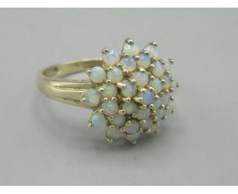 9ct yellow gold opal cluster ring, size V, stamped 375, 3.77g