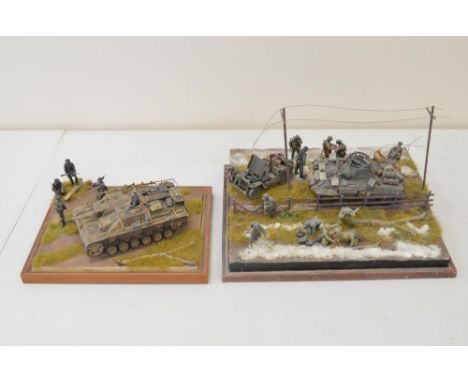 A pair of highly detailed and very well constructed 1/35 scale plastic model WWII German dioramas, one depicting captured Ame