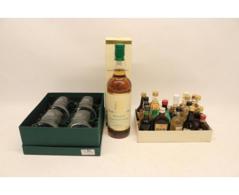 Bottle of boxed House of Commons Scotch whisky 70cl, with four house of commons branded whisky glasses in presentation box an