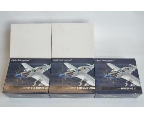 Three boxed 1/48 scale diecast North American P-51 Mustang models from Eagles International, models in fair/good condition, s