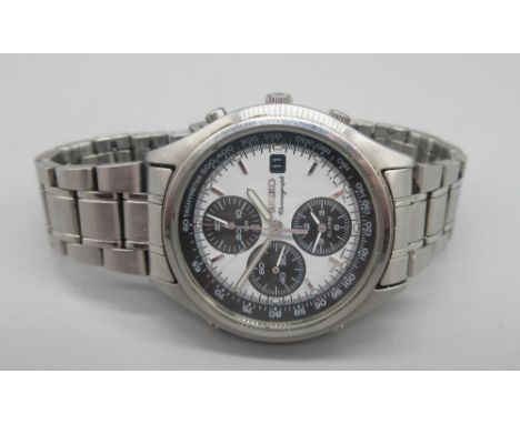 Seiko stainless steel quartz chronograph alarm wristwatch with date on original bracelet, signed white dial with three subsid