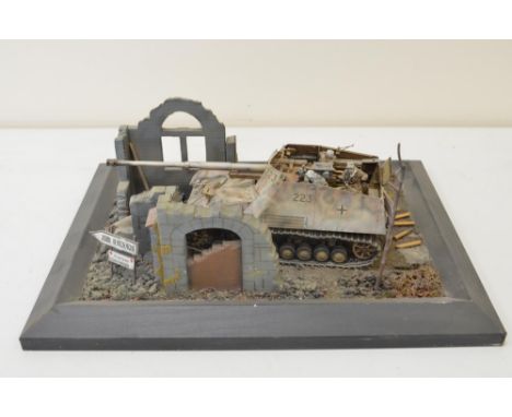 Highly detailed and very well constructed 1/35 scale plastic model WWII diorama depicting German Army Nashorn in action with 