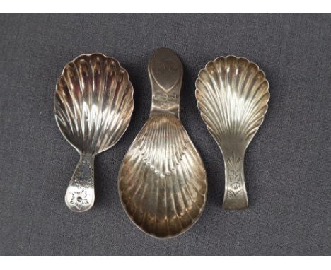 A George III silver caddy spoon, with a shell shaped bowl, Birmingham, 1813,  together with a George II silver caddy spoon wi