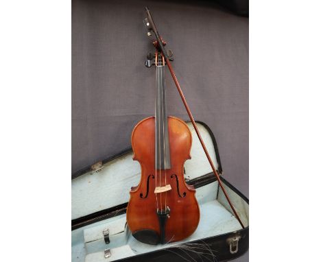 A violin with a one piece back and ebony stringing, bears a label for Louis Noebe, Homborg, 61cm long overall, back not inclu