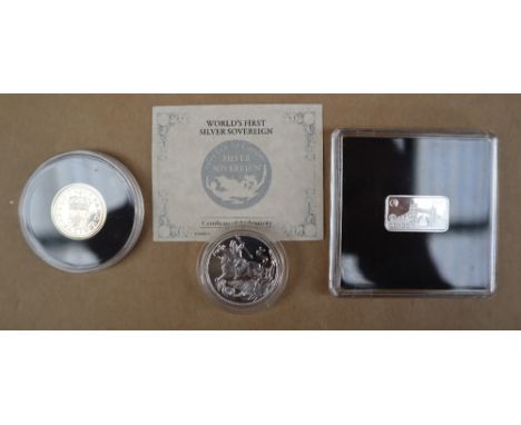 First Strike a silver sovereign one of 100,000, The London Mint together with a 2014 silver ingot on one side London tower br