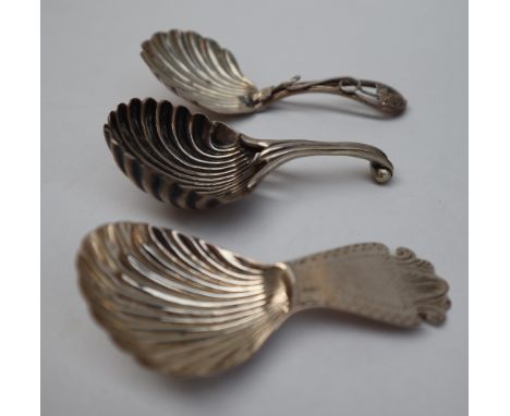 A George III silver caddy spoon, with a splayed handle and a shell shaped bowl, London, 1796, Elizabeth Morley together with 