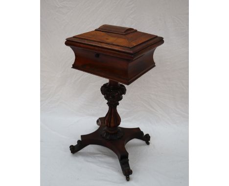 A Victorian rosewood teapoy, the hinged caddy top now enclosing a vacant lined interior, on a leaf capped baluster column on 