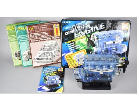 A Completed Haynes Kit of a Car Engine Together with Manuals 
