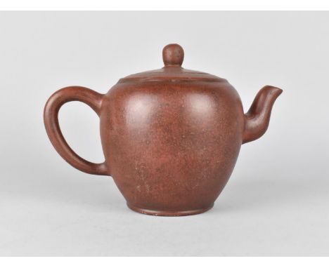 A Chinese Yixing Teapot, 13cm high, with Makers Mark to Lid and Seal Mark to Base 