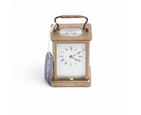 TWENTIETH CENTURY BRASS CARRIAGE CLOCK
lion stamped single train movement with lever platform escapement, the white enamel di