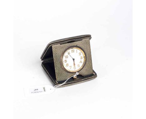 1930s LEATHER CASED EIGHT DAY TRAVEL CLOCK
unsigned fifteen jewels keyless wind movement, the white dial with stylised Arabic