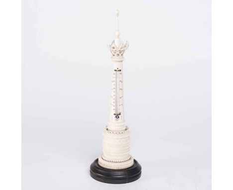 EARLY TWENTIETH CENTURY IVORY TOWER THERMOMETER
with dual Fahrenheit and centigrade scales, with turned finial and pierced co