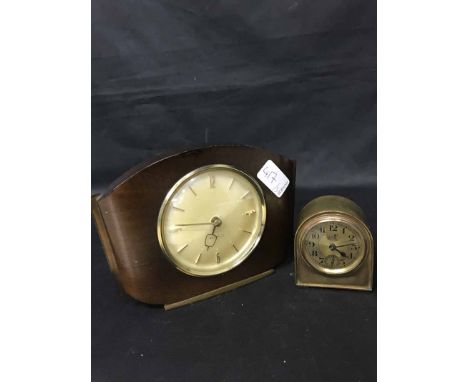 SMALL BRASS CLOCKof arched form, along with another clock and a clock/barometer