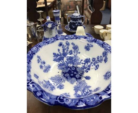 LOT OF BLUE AND WHITE CERAMICS including a basin,candlestick, jug etc 