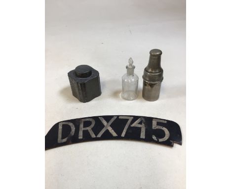 A vintage car number plate, a metal cased travelling medicine bottle etched with drams marked to base Fisher, Strand 188 also