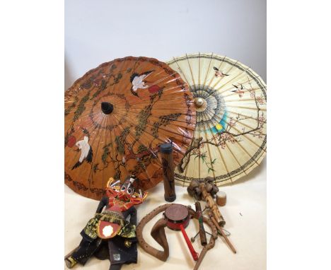 Two hand painted paper parasols, a puppet, reticulated wooden python and other it ed 