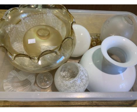 A collection of vintage glass light shades. 