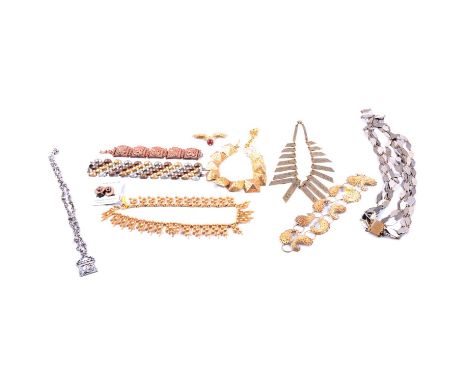 A collection of vintage costume jewellery in brutalist and retro designs, a copper coloured 30mm wide five panel bracelet sho