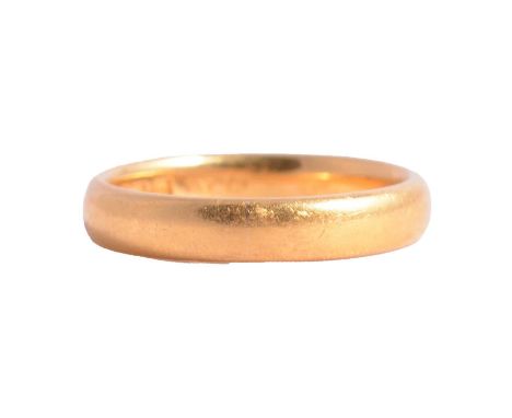 A 22 carat yellow gold wedding band, 3.6mm wide plain polished D shape ring size M, London 1921, 5.2g.