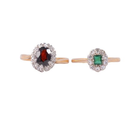 Two gemset rings, emerald and diamond, garnet and diamond, an emerald and diamond cluster ring, the rectangular cut emerald s