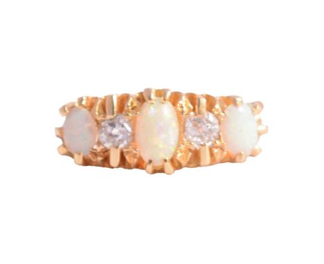 An opal and diamond five stone ring, three oval cabochon cut opals spaced by two old cut diamonds, claw set in an all yellow 