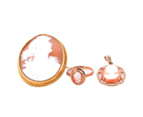 A cameo brooch, pendant and ring, an oval carved shell cameo brooch, female profile with harp facing right, in a yellow metal