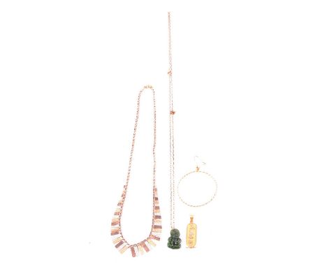 A 9 carat tricolour gold fringe necklace, Egyptian pendant, gold earring, Maori charm and chain, a 9 carat tricolour gold gra