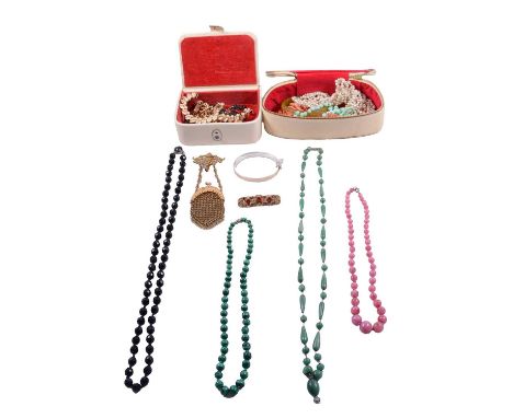 A collection of bead necklaces, cameo brooches, Albert watch chains, charms, and costume jewellery, a malachite and plastic b
