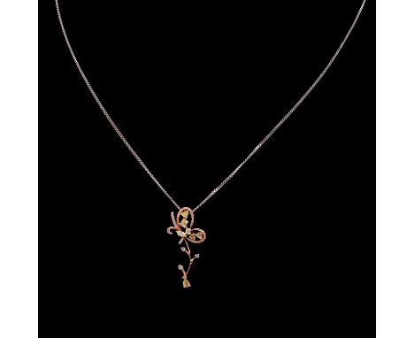 A diamond ribbon spray pendant and chain, six diamonds - marquise, heart shape, oval and brilliants claw set in a yellow and 