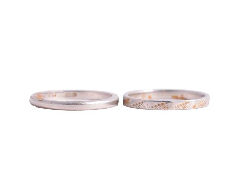 Two platinum wedding bands and one other unmarked ring, the 2mm wide platinum wedding bands marked Plat and Platinum, ring si
