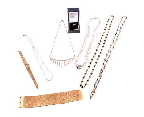 A yellow metal necklace testing as gold and costume jewellery, eternity ring, a yellow metal fringe necklace with thirteen tw