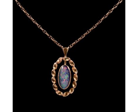 An opal triplet pendant and carved shell cameo brooch, an opal triplet pendant, the oval opal triplet, approximately 19.5x10.