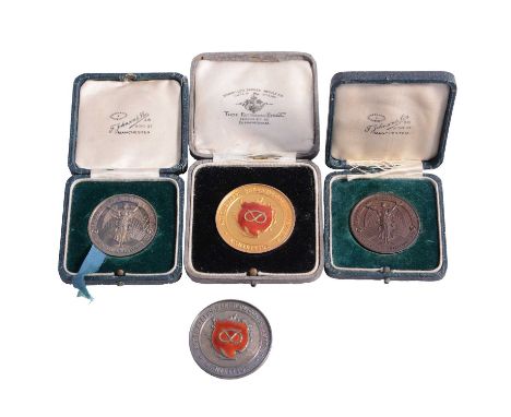 One 9 carat gold, two silver and one bronze bakers' medals, a 9 carat yellow gold and red enamel North Staffs Bakers' &amp; C