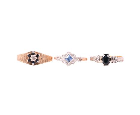 Three sapphire and diamond rings, an 18 carat yellow gold and platinum three stone ring size J; another with a square sapphir