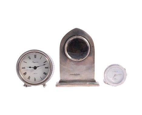A Tregawne silver cased clock, silver clock case and a small Links clock, the 64mm diameter Tregawne quartz clock of an engin