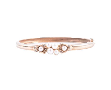 A cultured pearl and diamond half hinged bangle, the six cultured pearls post set and six 8 cut diamonds claw set to an appli