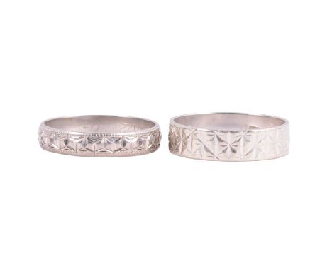 Two 18 carat white gold wedding bands, both with bright cut patterns, 5mm wide flat band ring size O, London 1965; 4mm wide D