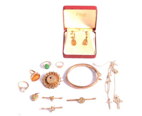 Four rings, two crosses on chains, pair of citrine earrings, four brooches, and gold-plated jewellery, a citrine dress ring, 