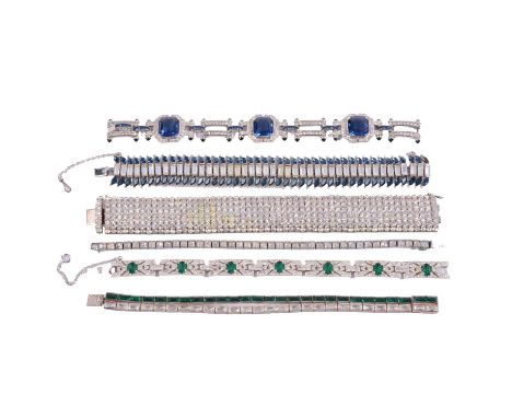 Six Art Deco and later paste set panel and tennis bracelets, a 21mm wide paste set articulated bracelet, the seven rows of fi