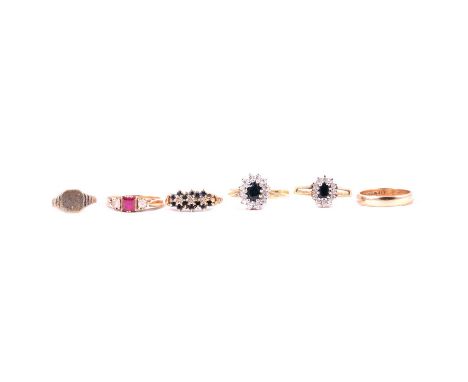A 9 carat gold wedding ring, gemset rings, sapphire and synthetic white stone earrings, silver ring, a 9 carat yellow gold we