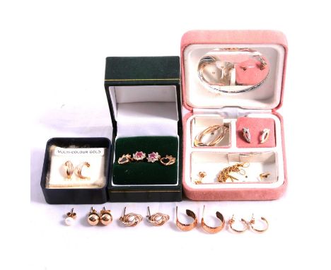 Twelve pairs of gold / yellow metal earrings for pierced ears, some gemset, a pair of ruby and synthetic white stone cluster 