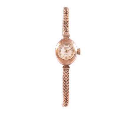 Majex - a vintage lady's 9 carat yellow gold manual wind bracelet wristwatch, 10mm circular raised baton dial with Arabic num