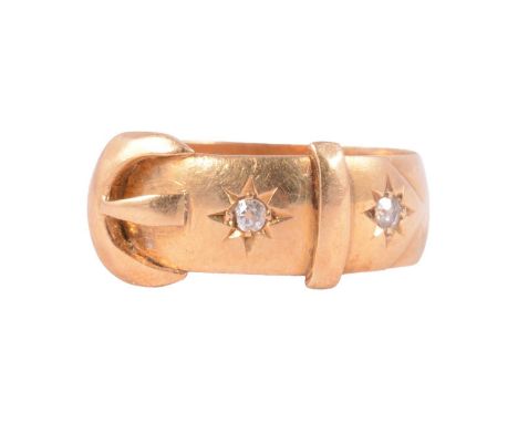 A diamond set buckle ring, 18 carat yellow gold 6.5mm wide plain polished D shape band, buckle design to front, star gypsy se