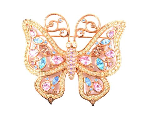 Swarovski - a large vintage butterfly brooch, gold plated and set with pink, blue, pale green cinnamon and clear paste, 85mm,