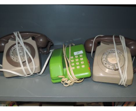 A selection of vintage telephones including green case