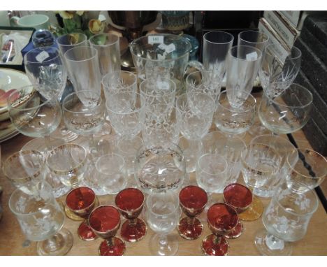 A selection of cocktail wine and spirit glasses including ruby